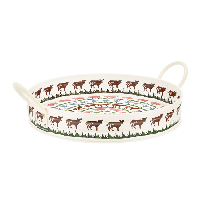 An oval ceramic serving tray with two loop handles, decorated with a border of brown deer and green grass, and a colorful floral pattern in the center, shown on a plain white background.