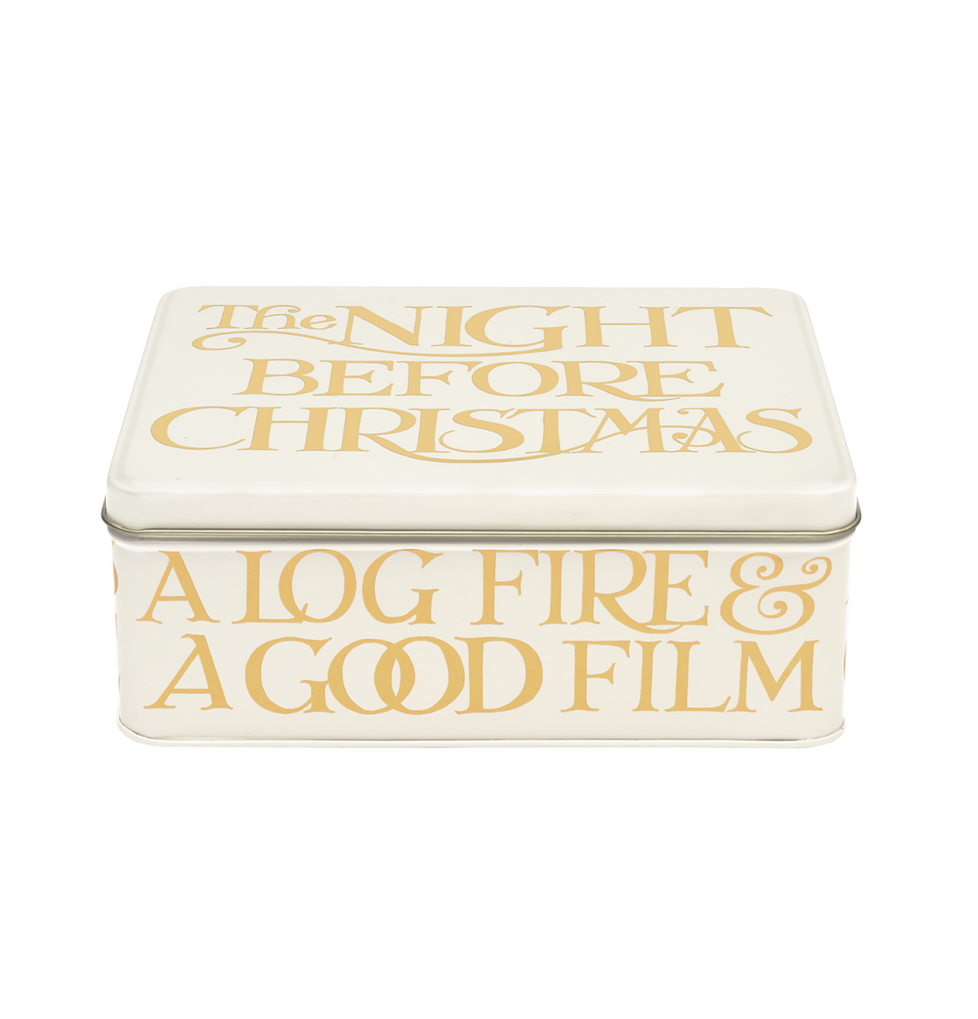 A square cream-colored metal tin with gold foil text reading &