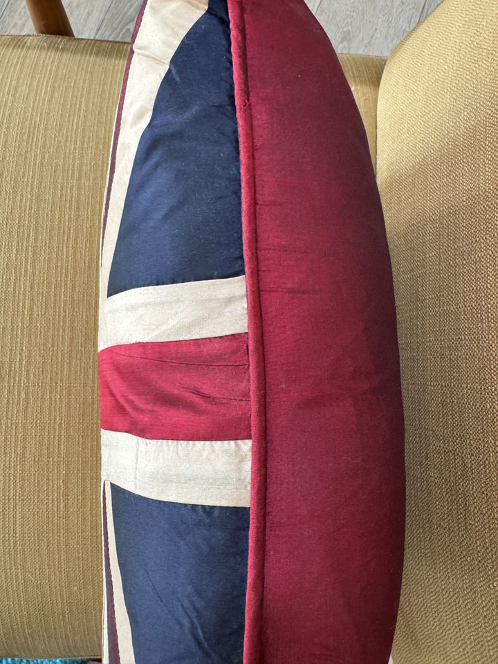 Cushion with a Union Jack design on a beige chair